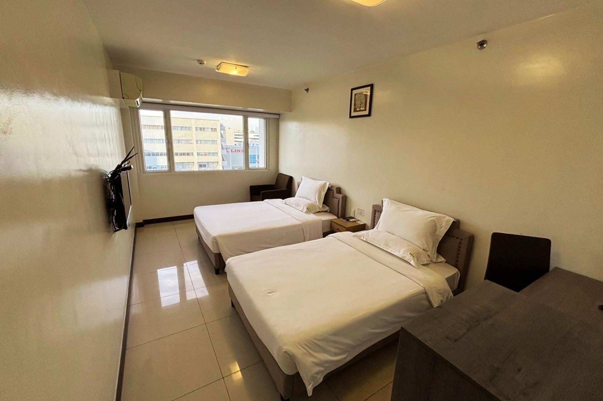 เอ็กทรีมเมลี สวีท Apartment มะนิลา ภายนอก รูปภาพ